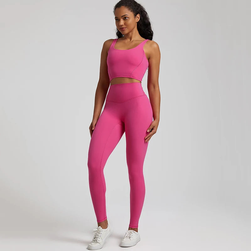 2-piece buttery soft nylon yoga short set for women, featuring a supportive push-up sports bra and high-waisted yoga shorts. This stylish tracksuit is designed for comfort and performance, ideal for workouts, yoga, and active lifestyles. Made from ultra-soft, stretchy fabric that moves with you, offering a flattering fit and maximum freedom of movement. Perfect for both casual wear and intense exercise sessions."