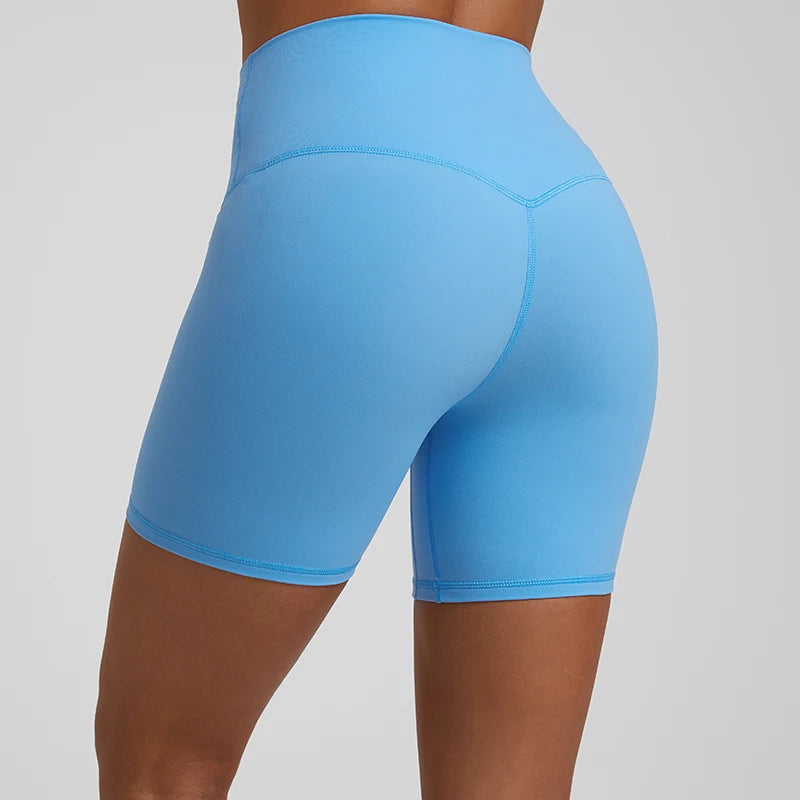 High-waisted, no front seam biker shorts for women, made from buttery-soft spandex. Perfect for gym workouts, yoga, and sports, offering comfort, support, and a flattering fit with 5-inch inseam.