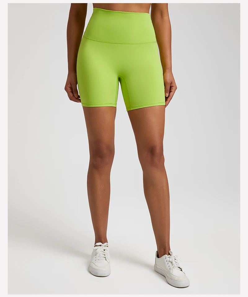 High-waisted, no front seam biker shorts for women, made from buttery-soft spandex. Perfect for gym workouts, yoga, and sports, offering comfort, support, and a flattering fit with 5-inch inseam.