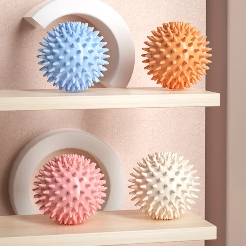 Hedgehog massage ball for muscle relaxation, designed for yoga, fascia release, and sports fitness. This spiky meridian ball targets the shoulder, neck, legs, and soles, providing effective relief from tension and promoting deep tissue massage with its unique texture. Ideal for post-workout recovery and stress relief.