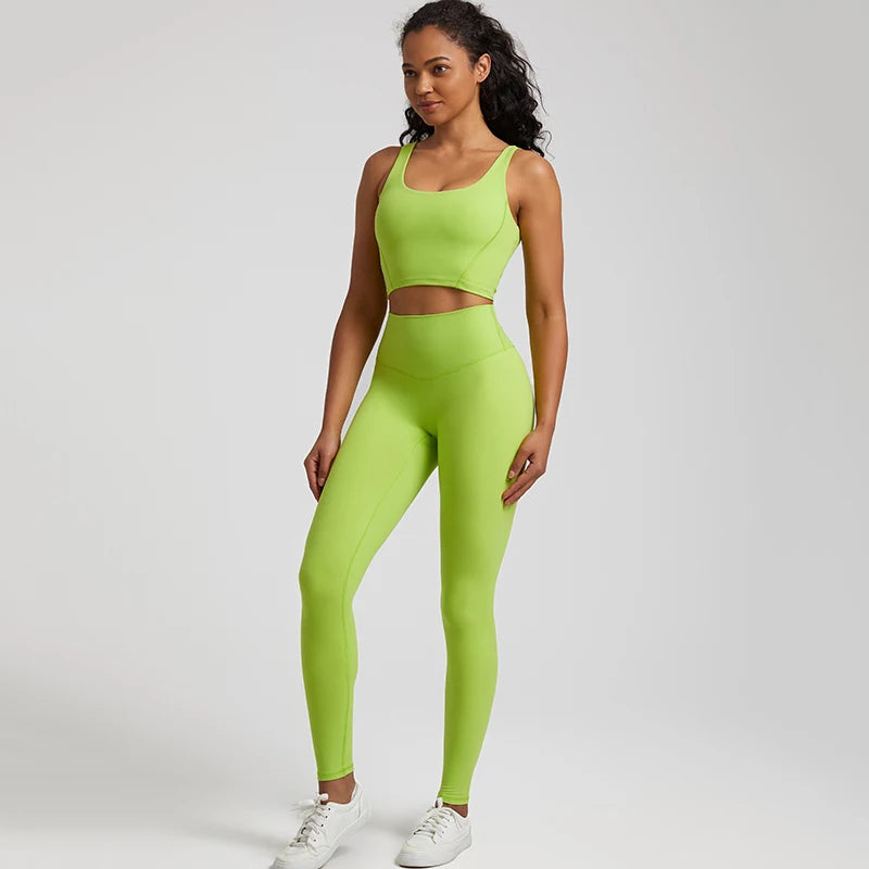 2-piece buttery soft nylon yoga short set for women, featuring a supportive push-up sports bra and high-waisted yoga shorts. This stylish tracksuit is designed for comfort and performance, ideal for workouts, yoga, and active lifestyles. Made from ultra-soft, stretchy fabric that moves with you, offering a flattering fit and maximum freedom of movement. Perfect for both casual wear and intense exercise sessions."