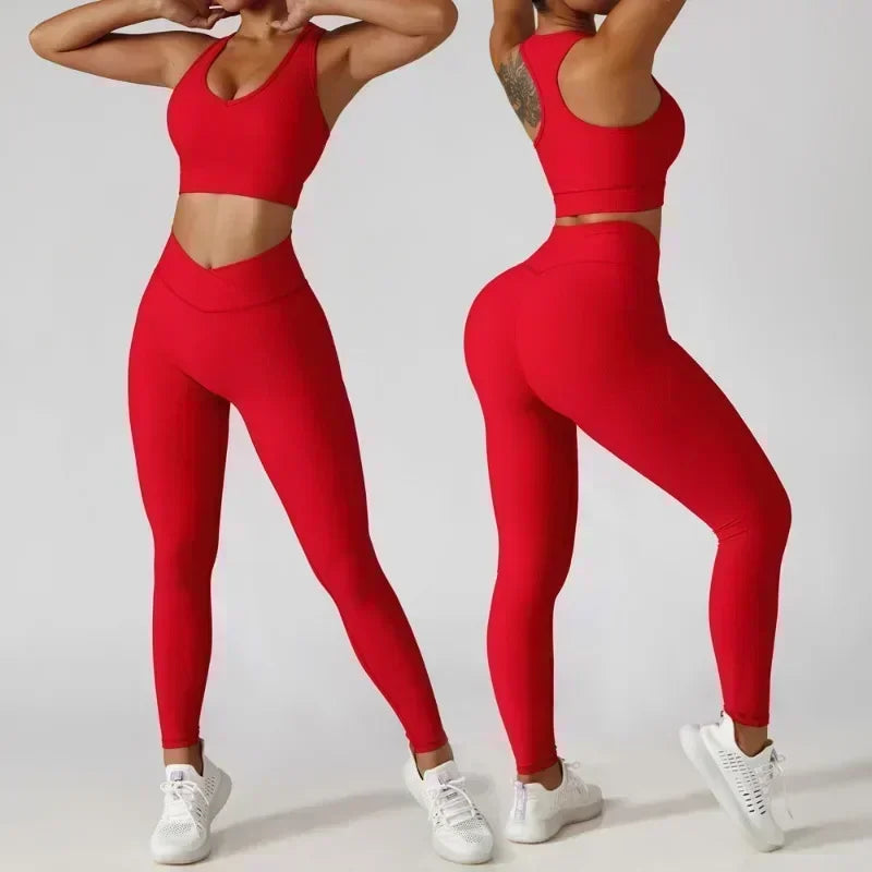 Women's 3-Piece Tracksuit Set featuring a stylish jacket, sports bra, and leggings. Designed for comfort and support, perfect for workouts, yoga, and gym training. The high-performance material offers a flattering fit, enhanced flexibility, and breathable fabric for maximum mobility and confidence during exercise. Ideal for fitness enthusiasts seeking a versatile, chic sportswear set.