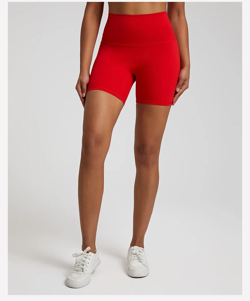 High-waisted, no front seam biker shorts for women, made from buttery-soft spandex. Perfect for gym workouts, yoga, and sports, offering comfort, support, and a flattering fit with 5-inch inseam.