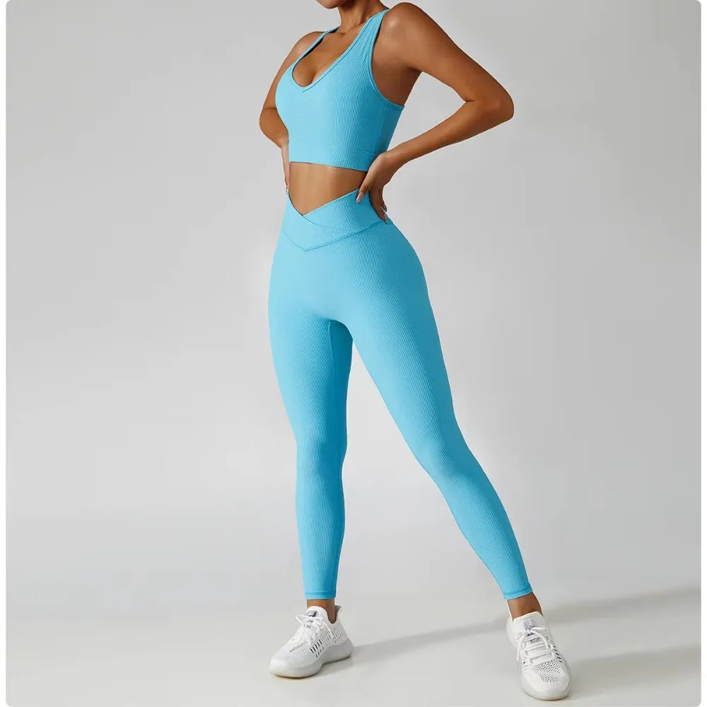 Women's 3-Piece Tracksuit Set featuring a stylish jacket, sports bra, and leggings. Designed for comfort and support, perfect for workouts, yoga, and gym training. The high-performance material offers a flattering fit, enhanced flexibility, and breathable fabric for maximum mobility and confidence during exercise. Ideal for fitness enthusiasts seeking a versatile, chic sportswear set.