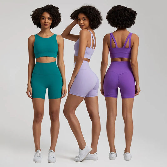 Two-piece women's yoga set featuring a stretchy nylon fabric for maximum comfort and flexibility. The set includes a crop tank bra with supportive design and matching biker shorts, perfect for workouts, fitness routines, running, or casual gym wear. Ideal for active women looking for a stylish and functional sportswear set that enhances performance and provides all-day comfort."