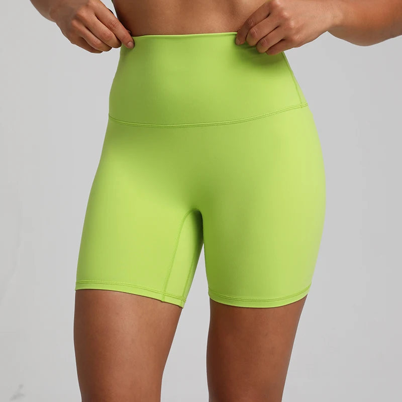 High-waisted, no front seam biker shorts for women, made from buttery-soft spandex. Perfect for gym workouts, yoga, and sports, offering comfort, support, and a flattering fit with 5-inch inseam.